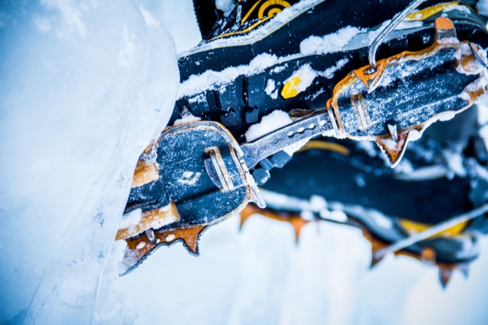 Crampons in Ice by Bill Grasse