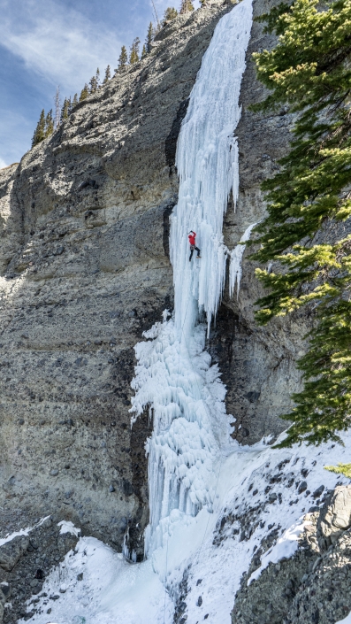 Grant Kleeves climbs the ice of Resignator Pillar in the Cimarrons